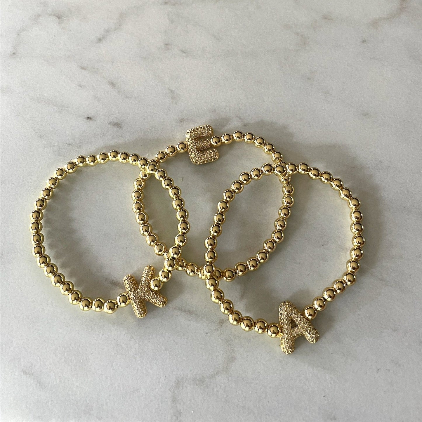 18K gold-filled beaded bracelet with custom pavé letter charm, perfect for stacking